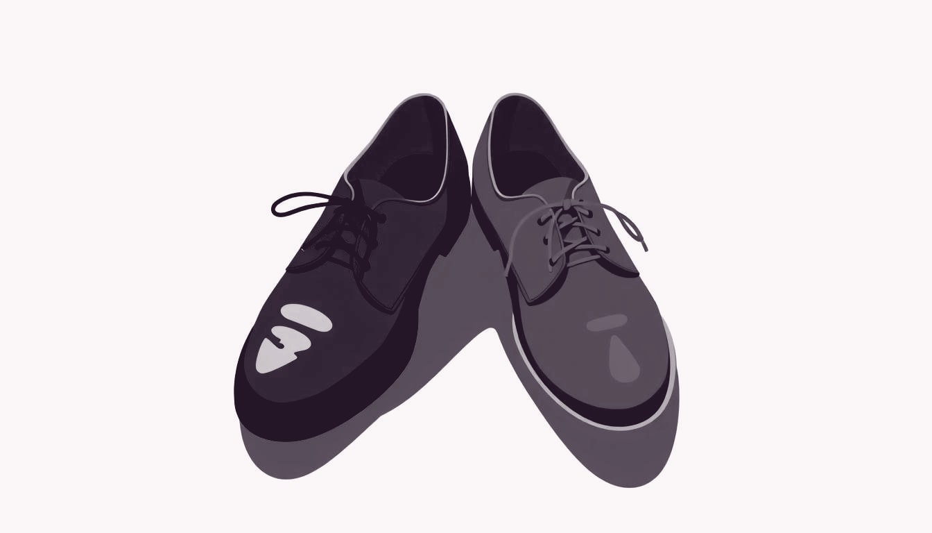 A single pair of shoes, one polished and bright, the other worn and muted, placed side by side on a floor